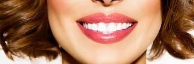 Close up of woman's smile after teeth whitening in Apex NC