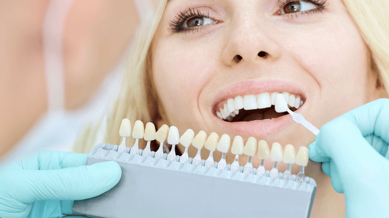 A lady during a visit to a Cosmetic Dentist in Apex