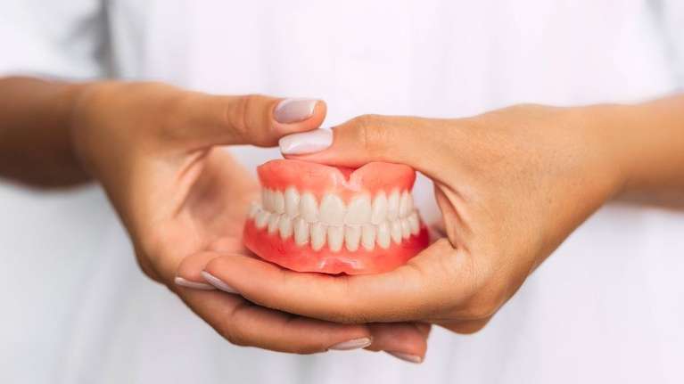 An image depicting Full denture in Apex, NC