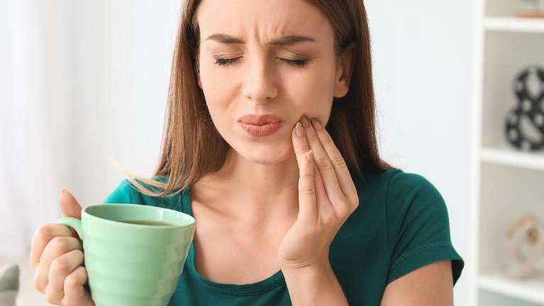 a lady with a Dental Emergency in Apex, NC