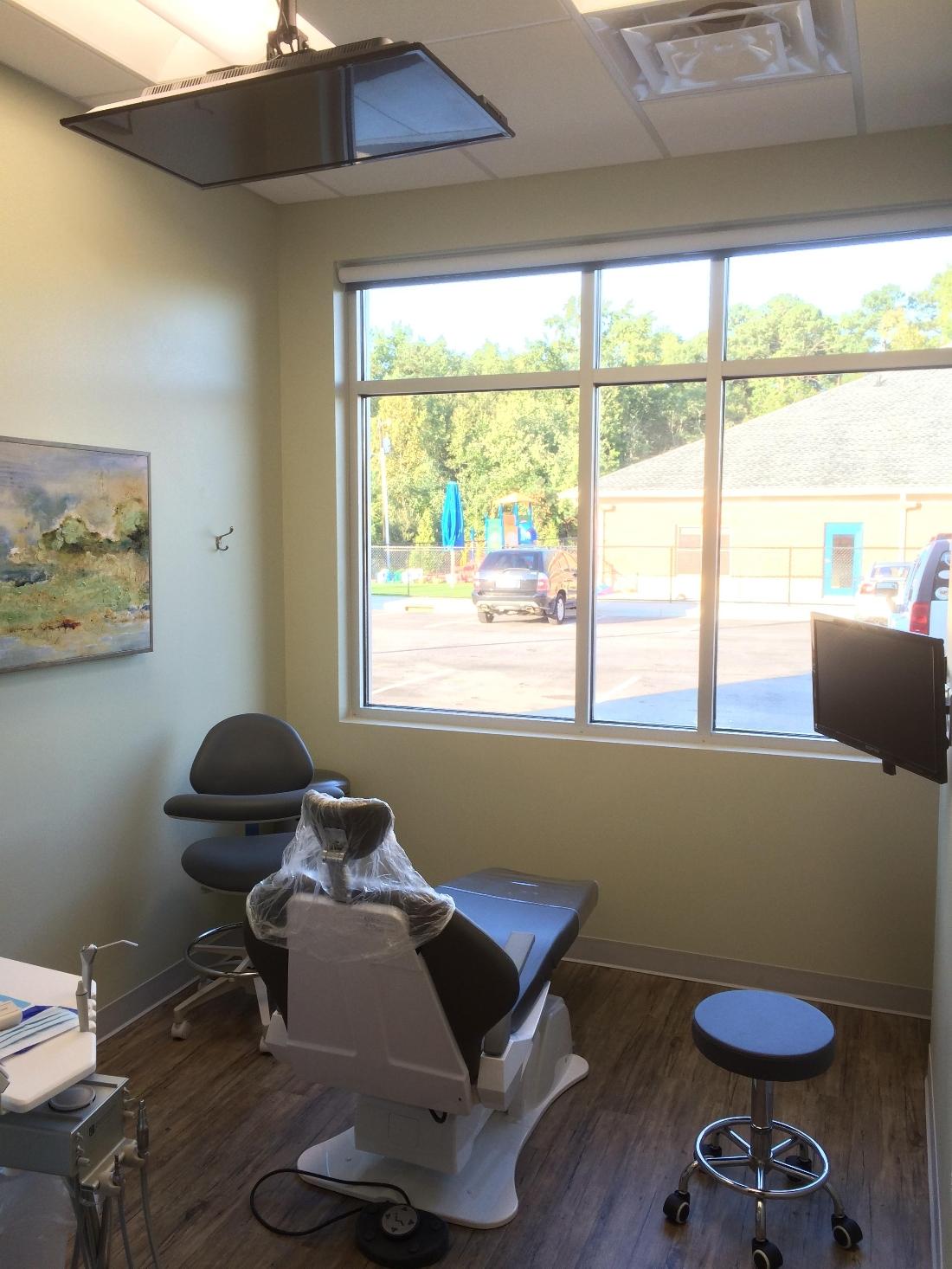 Comfortable patient treatment room at our 27502 dentist office