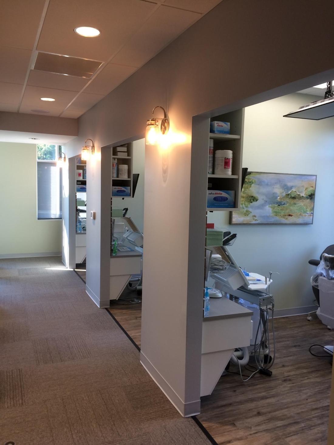 Hallway of treatment rooms at Olive Chapel Family Dentistry in Apex, NC